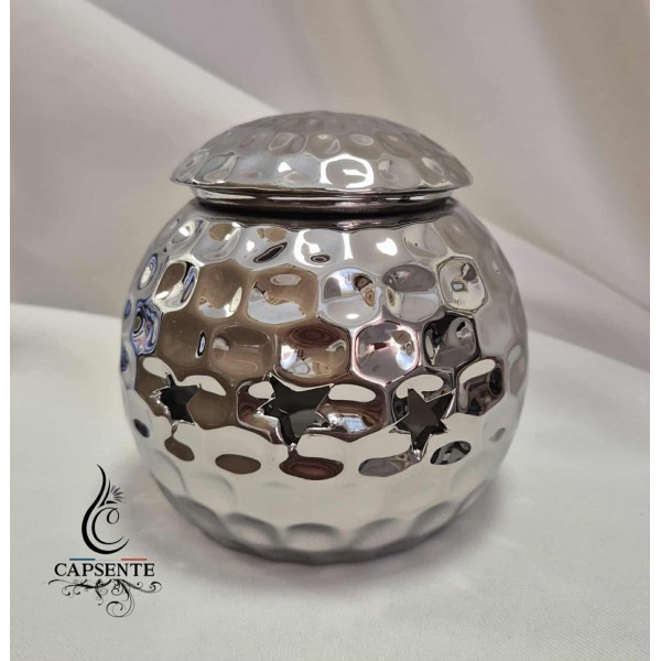 Brûleur boule argenté pour cire parfumée.